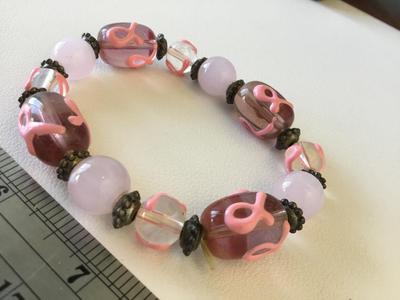 Light pink glass beaded stretchy awareness bracelet