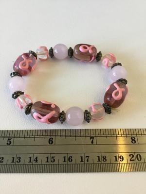 Light pink glass beaded stretchy awareness bracelet