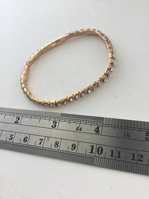 Gold tone stretchy rhinestone bracelet