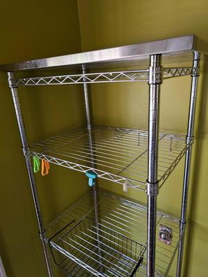 Stainless steel adjustable storage shelf with an assortment of hooks and clips - and some wood for shelves can honey do NSF Marked