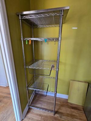 Stainless steel adjustable storage shelf with an assortment of hooks and clips - and some wood for shelves can honey do NSF Marked