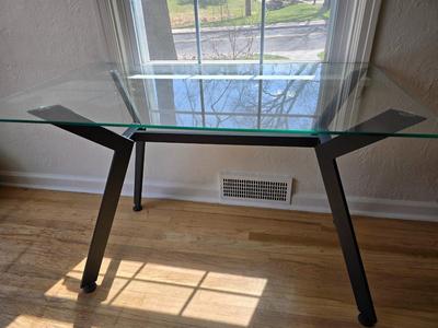 Strut glass topped Dining room / Kitchen table / Desk with black frame legs