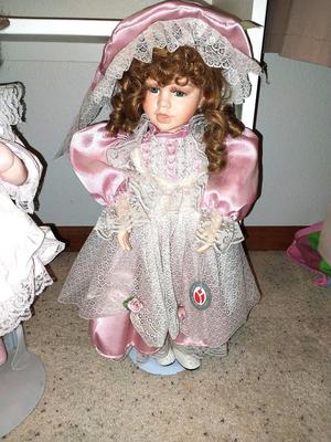 TWO PORCELIAN DOLLS