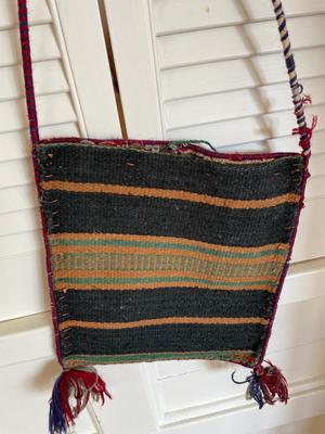 Assorted handwoven bags from various countries