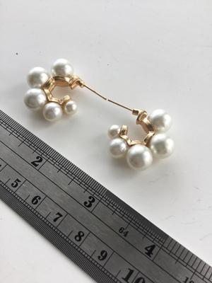 Gold tone faux pearl fashion earrings