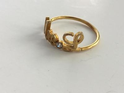 Mrs. L unmarked fashion ring