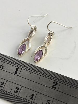 Beautiful rusty unmarked purple earrings