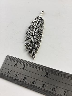 Unmarked leaf pendant charm