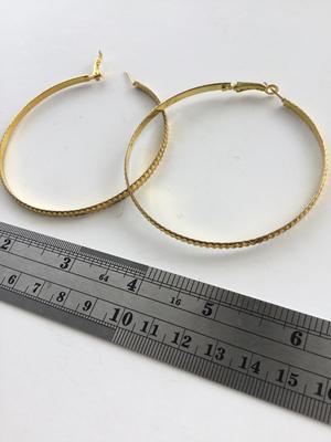 Beautiful gold tone hoop earrings