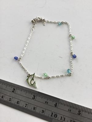 Avon marked dolphin bracelet