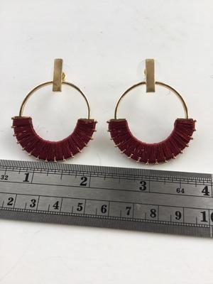 Unmarked red hoop fashion earrings