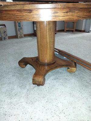 WOODEN PEDASTAL TABLE WITH FOUR LEAVES