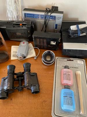 Transistor radios, camera lens, vintage binoculars