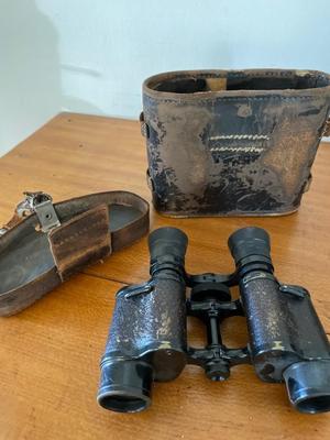 Transistor radios, camera lens, vintage binoculars