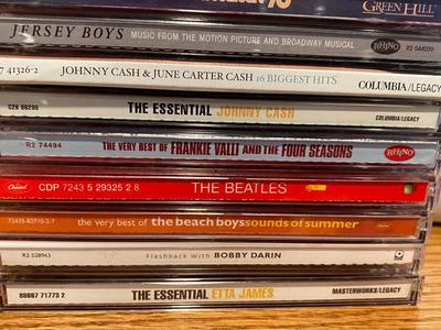 MUSIC ON CD AND A TRAVEL CASE