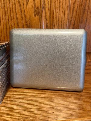 MUSIC ON CD AND A TRAVEL CASE