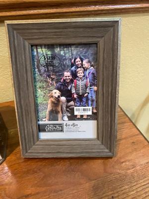 BOOKS, PICTURE FRAMES AND BRASS HOME DECOR