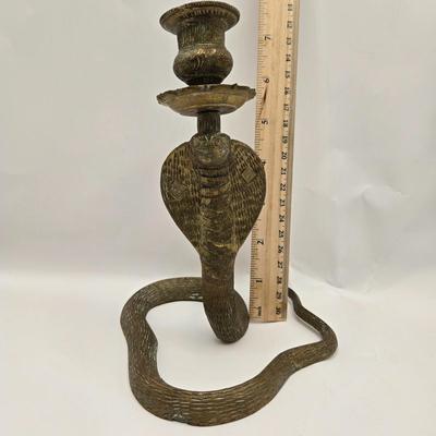 LOT 3: 18th, 19th Century Powder Horn , Brass Cobra Candle Holder, Polished Slab of Petrified Wood, and Vintage Leather Bull Whip