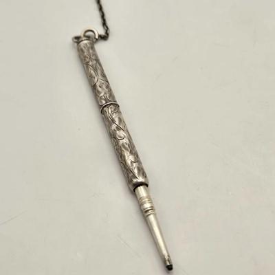 LOT 12: Antique Sterling Silver Chatelaine with Pen, Note Pad, Coin Holder, and Toothpick Holder (70 GTW)