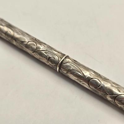 LOT 12: Antique Sterling Silver Chatelaine with Pen, Note Pad, Coin Holder, and Toothpick Holder (70 GTW)