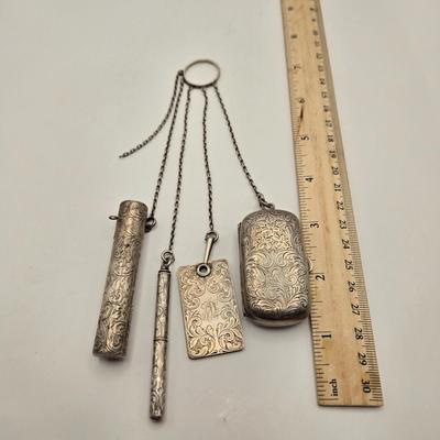 LOT 12: Antique Sterling Silver Chatelaine with Pen, Note Pad, Coin Holder, and Toothpick Holder (70 GTW)
