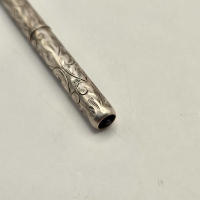 LOT 12: Antique Sterling Silver Chatelaine with Pen, Note Pad, Coin Holder, and Toothpick Holder (70 GTW)