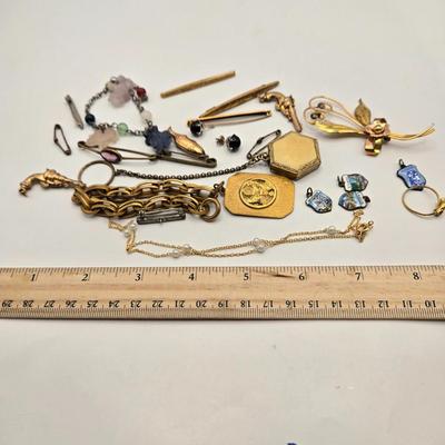 LOT 23: Costume Jewelry Including Gold Filled Ladies Brooch, Charms from Greece, Locket, Tie Bars, and More