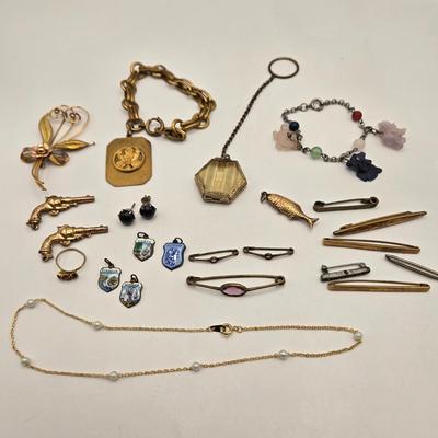 LOT 23: Costume Jewelry Including Gold Filled Ladies Brooch, Charms from Greece, Locket, Tie Bars, and More