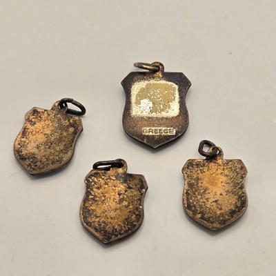 LOT 23: Costume Jewelry Including Gold Filled Ladies Brooch, Charms from Greece, Locket, Tie Bars, and More