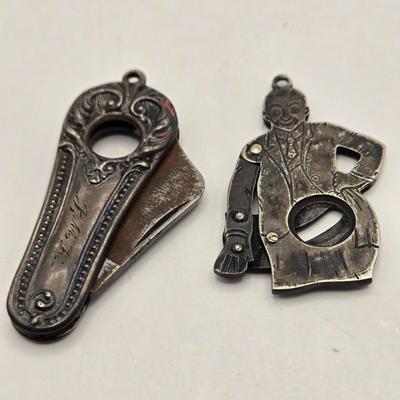 LOT 26: Two Antique Cheroot or Cigar Cutters/ One Marked Sterling Silver