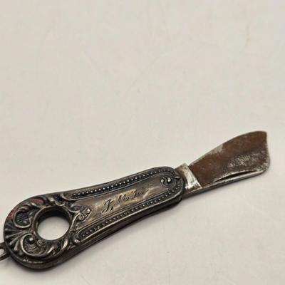 LOT 26: Two Antique Cheroot or Cigar Cutters/ One Marked Sterling Silver