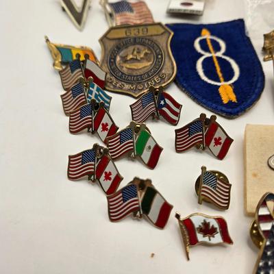 LOT 27: Vintage Cast Iron Shriner Fez Paperweight, Commemorative Free Mason Trowel, Lapel Pin, Keychain, and Small Box of Various Pins...