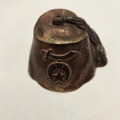 LOT 27: Vintage Cast Iron Shriner Fez Paperweight, Commemorative Free Mason Trowel, Lapel Pin, Keychain, and Small Box of Various Pins...