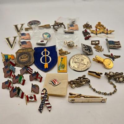 LOT 27: Vintage Cast Iron Shriner Fez Paperweight, Commemorative Free Mason Trowel, Lapel Pin, Keychain, and Small Box of Various Pins...