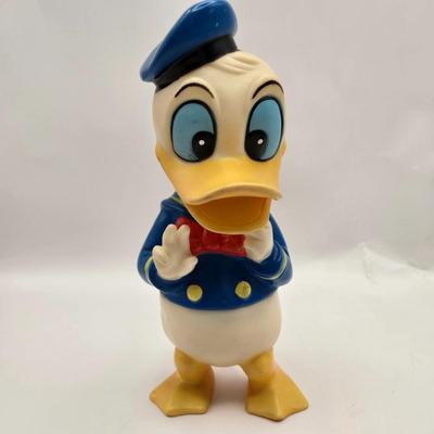 LOT 30: Poor Donald is Always Second Fiddle to Mickey: Vintage Donald Duck Squeak Toy, Kohner Donald Duck Push- Button Toy, Donald Duck...