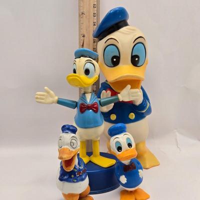 LOT 30: Poor Donald is Always Second Fiddle to Mickey: Vintage Donald Duck Squeak Toy, Kohner Donald Duck Push- Button Toy, Donald Duck...