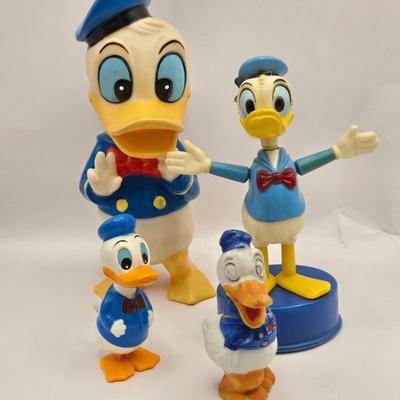 LOT 30: Poor Donald is Always Second Fiddle to Mickey: Vintage Donald Duck Squeak Toy, Kohner Donald Duck Push- Button Toy, Donald Duck...