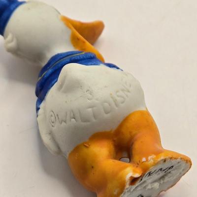 LOT 30: Poor Donald is Always Second Fiddle to Mickey: Vintage Donald Duck Squeak Toy, Kohner Donald Duck Push- Button Toy, Donald Duck...