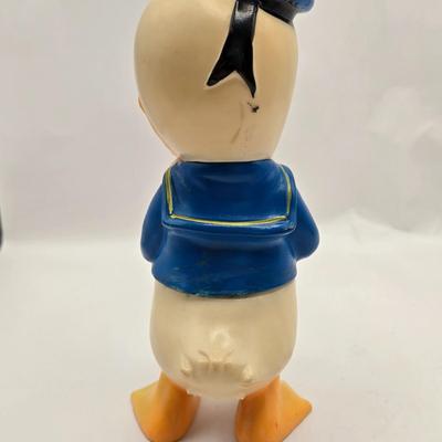 LOT 30: Poor Donald is Always Second Fiddle to Mickey: Vintage Donald Duck Squeak Toy, Kohner Donald Duck Push- Button Toy, Donald Duck...
