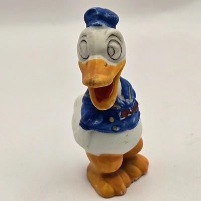 LOT 30: Poor Donald is Always Second Fiddle to Mickey: Vintage Donald Duck Squeak Toy, Kohner Donald Duck Push- Button Toy, Donald Duck...