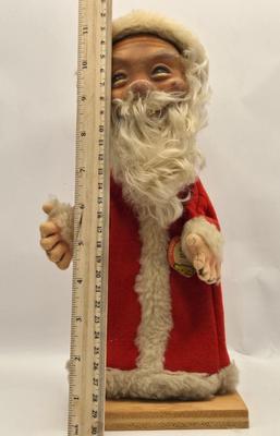 LOT 36: Vintage Cast Iron Santa Door Stop, Steiff Santa Hand Puppet, Putz Germany Santa Sleigh, Ceramic Santa & JC Penny Ornaments,...