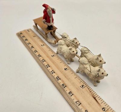 LOT 36: Vintage Cast Iron Santa Door Stop, Steiff Santa Hand Puppet, Putz Germany Santa Sleigh, Ceramic Santa & JC Penny Ornaments,...