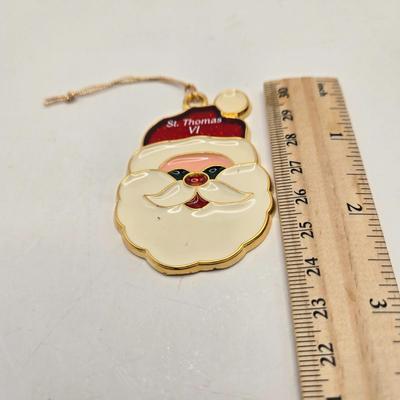 LOT 36: Vintage Cast Iron Santa Door Stop, Steiff Santa Hand Puppet, Putz Germany Santa Sleigh, Ceramic Santa & JC Penny Ornaments,...