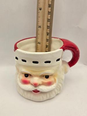 LOT 36: Vintage Cast Iron Santa Door Stop, Steiff Santa Hand Puppet, Putz Germany Santa Sleigh, Ceramic Santa & JC Penny Ornaments,...