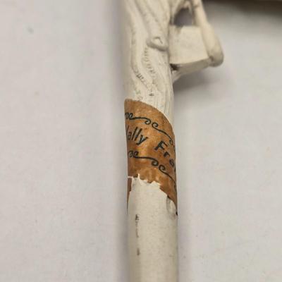 LOT 38: Vintage Pipe Rack with Multiple White Clay Pipes