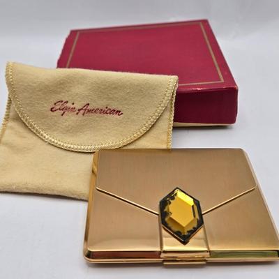 LOT 39: Vintage Stratton of London Compact, 2 Elgin American Compacts, Estee Lauder Compact, and Lipstick Compact