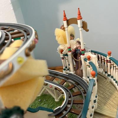 LOT 147: Enesco Small World Music Animated Colossal Coaster