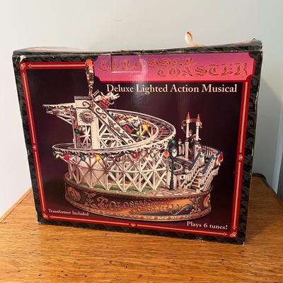 LOT 147: Enesco Small World Music Animated Colossal Coaster