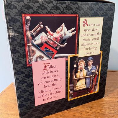 LOT 147: Enesco Small World Music Animated Colossal Coaster