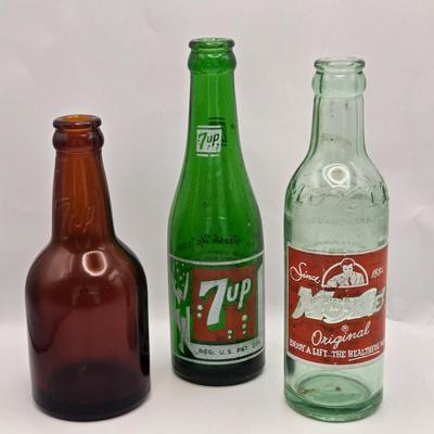 LOT 161: Multiple Vintage/Antique Glass Bottles Including Blue Tenpin Soda, Hires Root Beer, Flavoring Extracts, and More